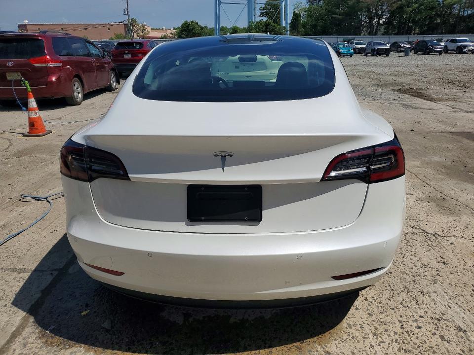 2021 Tesla VIN 5YJ3E1EA2MF031019 COPART salvage auction — SIDE, NJ - CERT OF TITLE-SALVAGE, sold $7,600 on 2026-07-27 (photo 6)