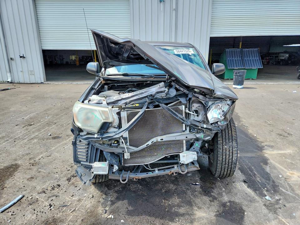 2014 Toyota Tacoma VIN 5TFNX4CNXEX032310 COPART salvage auction — FRONT END, Fl - Cert Of Title Slvg Rebuildable, sold $3,950 on 2026-07-22 (photo 5)