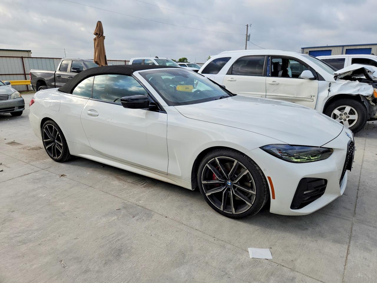 2023 BMW 4 Series VIN WBA23AT06PCM95070 COPART salvage auction — Hail, TX - CERTIFICATE OF TITLE, sold $28,750 on 2026-08-14 (photo 4)