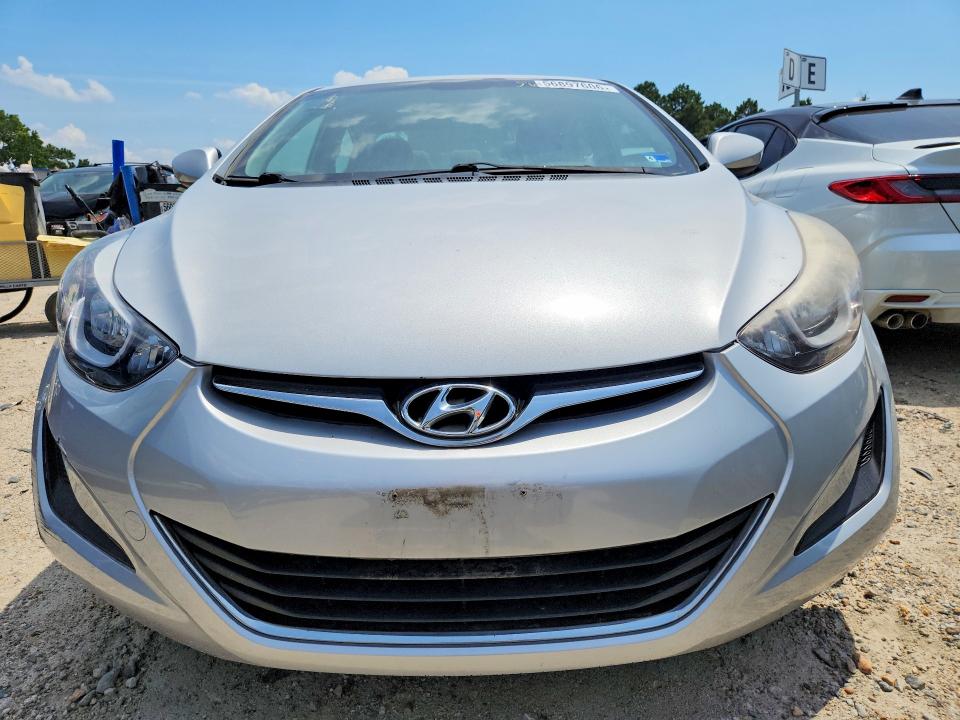 2014 Hyundai Elantra VIN KMHDH4AE9EU218588 COPART salvage auction — VANDALISM, VA - CERT OF TITLE - SALVAGE, sold $925 on 2026-07-28 (photo 5)
