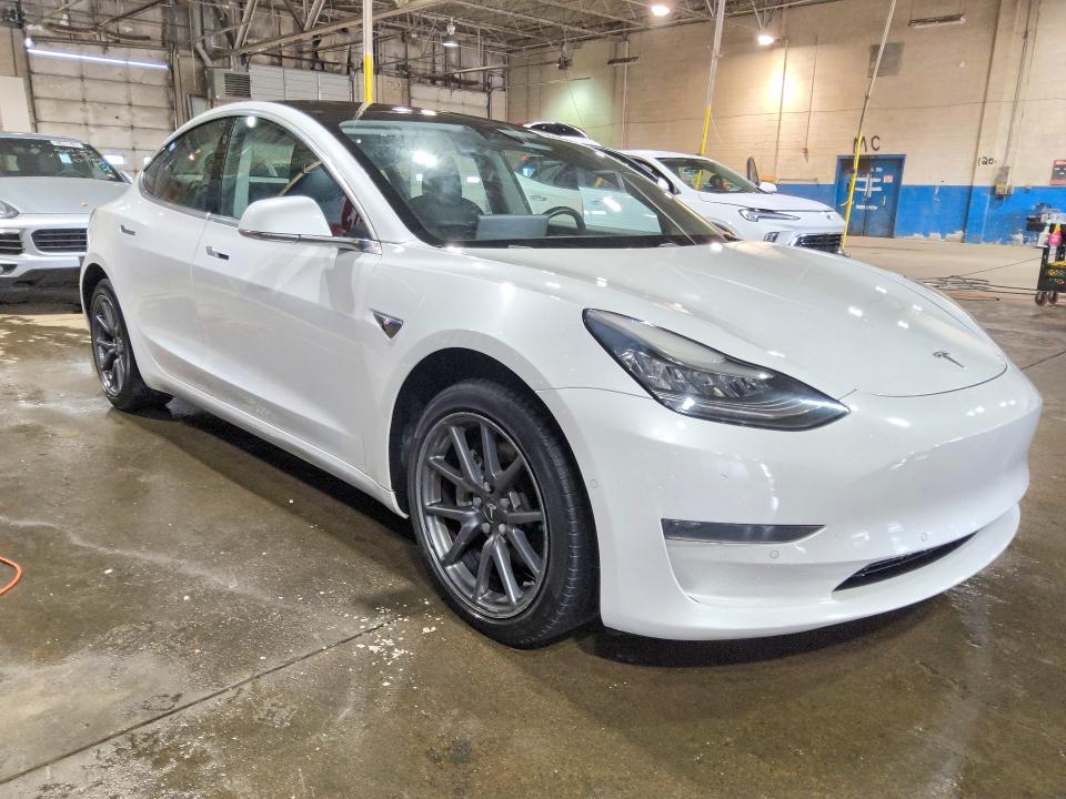 2020 Tesla Model 3 VIN 5YJ3E1EAXLF644830 COPART salvage auction — MINOR DENT/SCRATCHES, CA - CERTIFICATE OF TITLE, sold $4,550 on 2026-07-28 (photo 4)