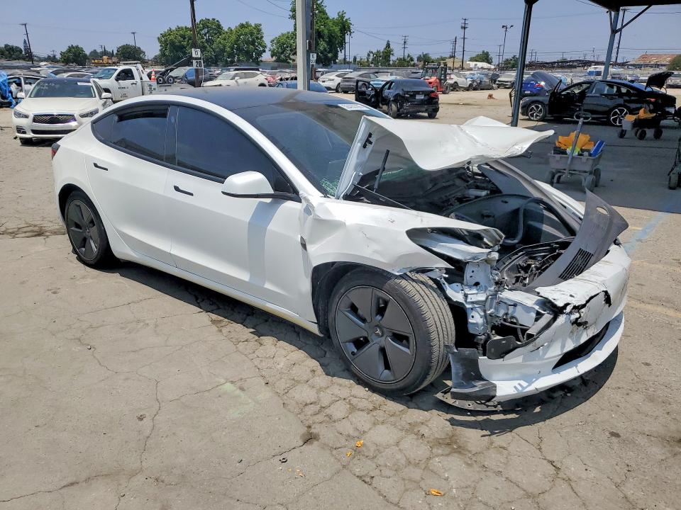 2023 Tesla VIN 5YJ3E1EAXPF502676 COPART salvage auction — FRONT END, Salvage Title, sold $5,100 on 2026-07-13 (photo 4)