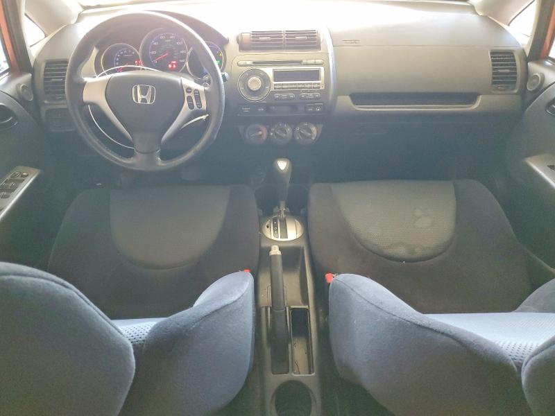 2007 Honda Fit VIN JHMGD38687S068539 COPART salvage auction — WATER/FLOOD, Tx - Salvage Title-Flood Damage, sold $550 on 2026-07-17 (photo 8)