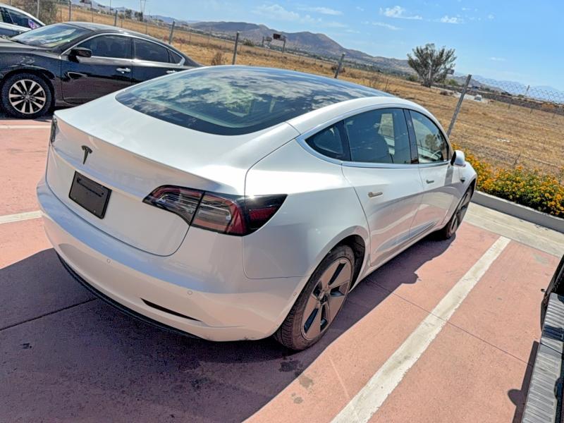2019 Tesla Model 3 VIN 5YJ3E1EA0KF431223 COPART salvage auction — DAMAGE HISTORY, Ca - Dlr/Dis/Exp Only Salvage Title (P), sold $5,000 on 2026-07-04 (photo 4)