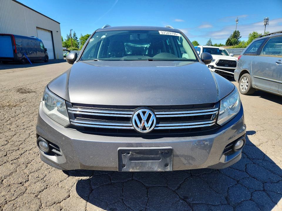 2014 Volkswagen Tiguan VIN WVGBV3AX7EW559231 COPART salvage auction — REAR END, Or - Salvage Title Certificate, sold $1,450 on 2026-07-27 (photo 5)