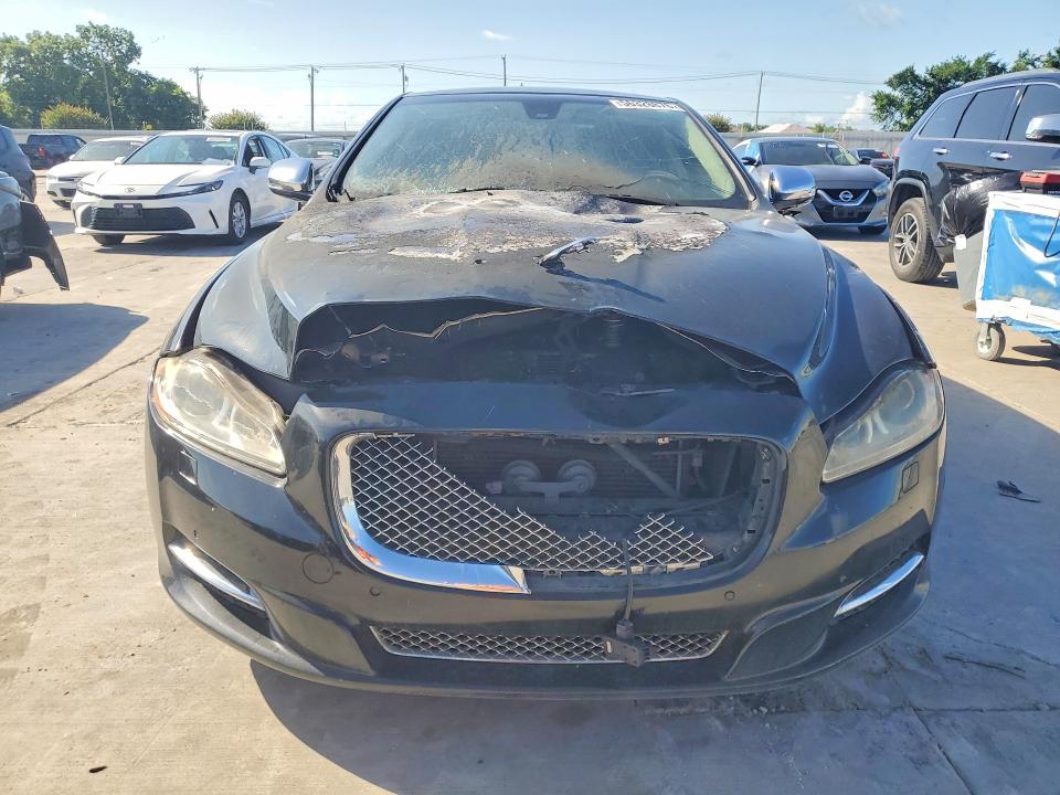 2015 Jaguar Xj series VIN SAJWJ2GD4F8V81199 COPART salvage auction — ENGINE BURN, Tx - Salvage Vehicle Title, sold $550 on 2026-07-02 (photo 5)