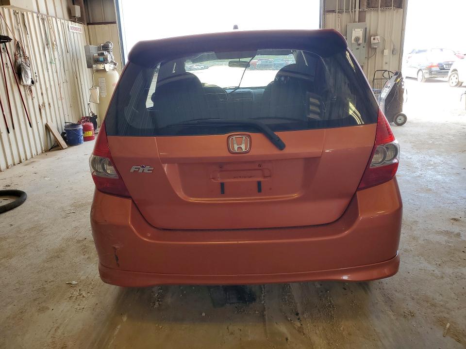 2007 Honda Fit VIN JHMGD38687S068539 COPART salvage auction — WATER/FLOOD, Tx - Salvage Title-Flood Damage, sold $550 on 2026-07-17 (photo 6)