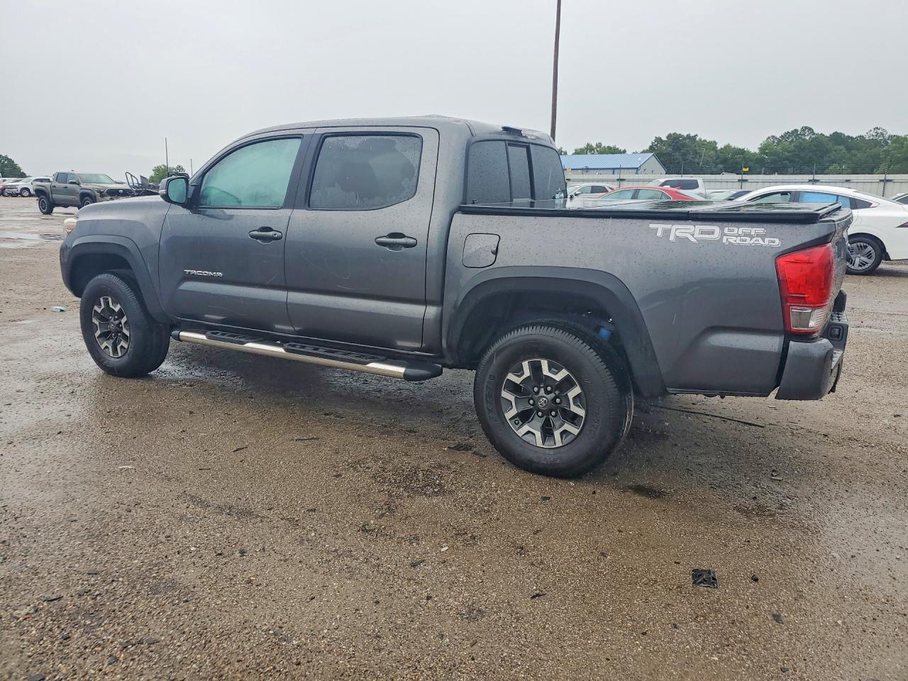 2016 Toyota Tacoma VIN 3TMAZ5CN3GM006414 COPART salvage auction — Top/Roof, FL - CERT OF TITLE SLVG REBUILDABLE, sold $10,300 on 2026-07-09 (photo 2)
