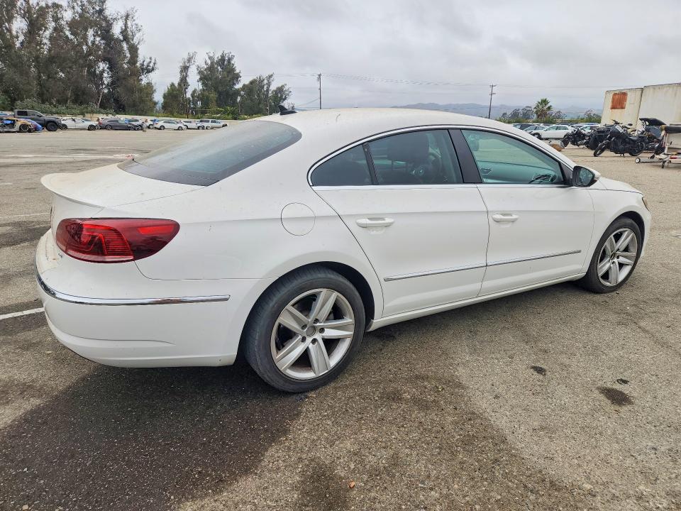 2014 Volkswagen Passat cc VIN WVWBP7AN4EE535804 COPART salvage auction — NORMAL WEAR, Ca - Dis/Dlr/Exp Only Clean Title (P), sold $600 on 2026-07-28 (photo 3)