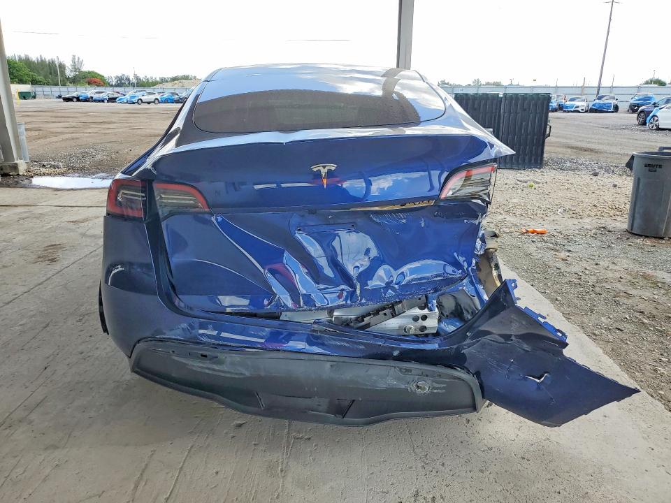 2025 Tesla Model y VIN 7SAYGDED8SF234606 COPART salvage auction — REAR END, Fl - Certificate Of Destruction, sold $9,100 on 2026-08-01 (photo 6)