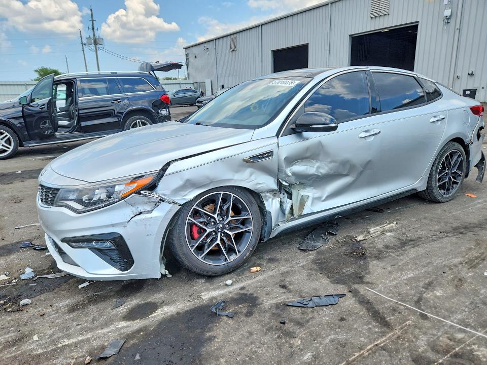 2019 Kia Optima VIN 5XXGW4L23KG355571 COPART salvage auction — SIDE, Fl - Cert Of Title Slvg Rebuildable, sold $1,500 on 2026-07-13 (photo 1)
