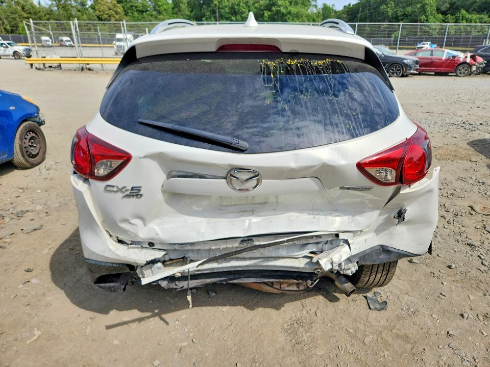2014 Mazda VIN JM3KE4DY9E0415611 COPART salvage auction — REAR END, MD - CERT OF SALVAGE > 75% DAMAGE, sold $2,450 on 2026-07-10 (photo 6)