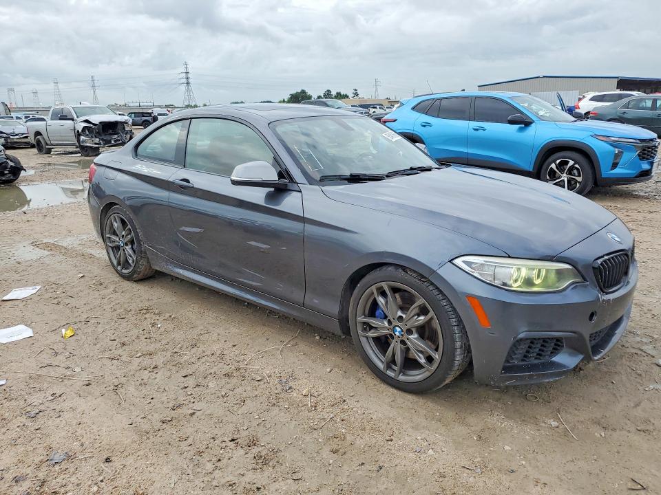 2015 BMW M2 VIN WBA1J7C57FV289078 COPART salvage auction — MINOR DENT/SCRATCHES, Tx - Certificate Of Title (P), sold $13,000 on 2026-07-17 (photo 4)