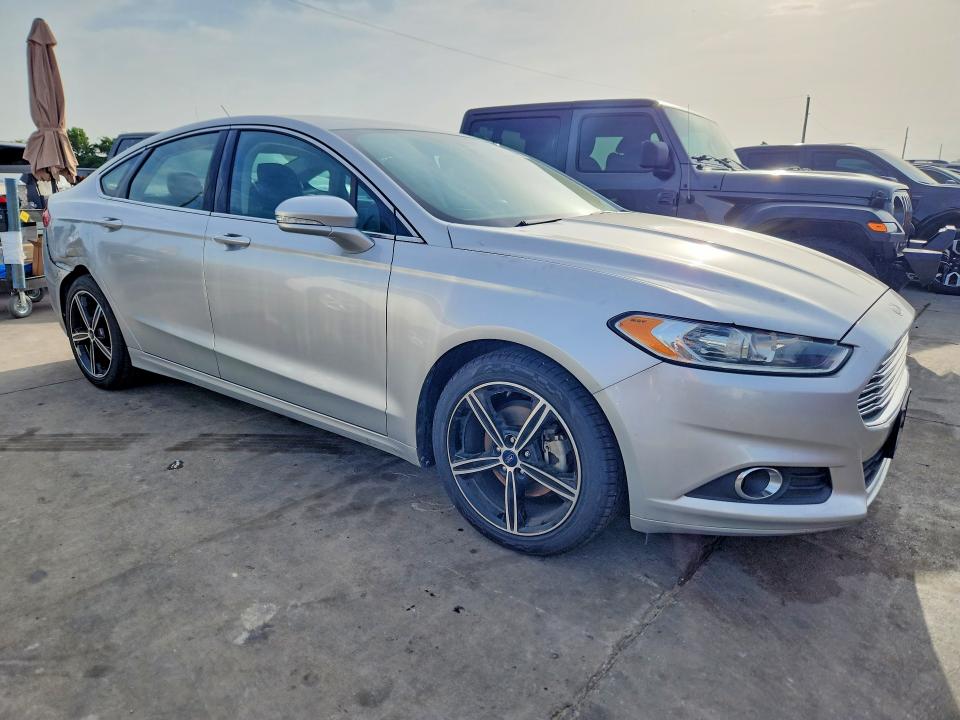 2014 Ford Fusion VIN 1FA6P0HD7E5379270 COPART salvage auction — SIDE, Tx - Salvage Vehicle Title, sold $1,250 on 2026-07-09 (photo 4)