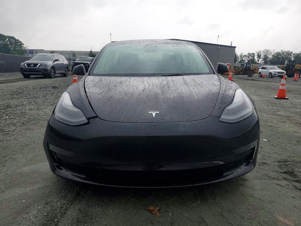 2023 Tesla Model 3 VIN 5YJ3E1EB0PF632233 COPART salvage auction — SIDE, Sc - Cert Of Title-Salvage, sold $10,000 on 2026-07-15 (photo 5)