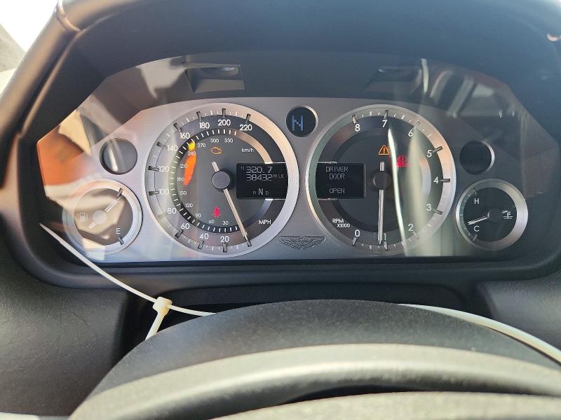 2012 Aston martin V8 vantage VIN SCFEKBDL0CGC16091 COPART salvage auction — MINOR DENT/SCRATCHES, TX - SALVAGE VEHICLE TITLE, sold $21,200 on 2026-09-10 (photo 9)