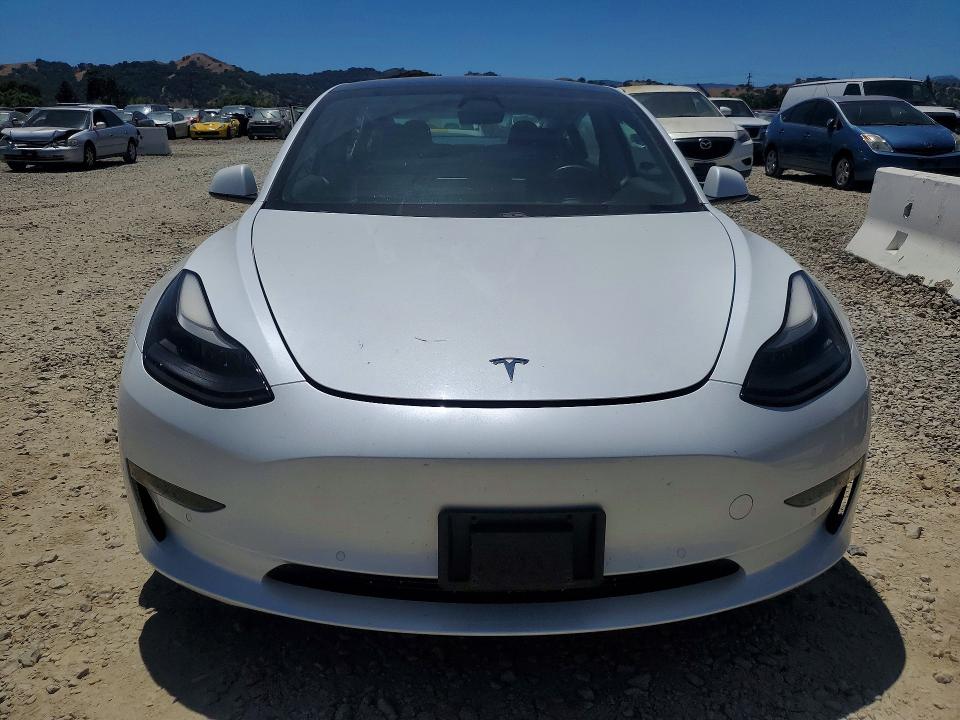 2021 Tesla Model 3 VIN 5YJ3E1EA9MF876949 COPART salvage auction — SIDE, CA - SALVAGE CERTIFICATE, sold $7,800 on 2026-07-16 (photo 5)
