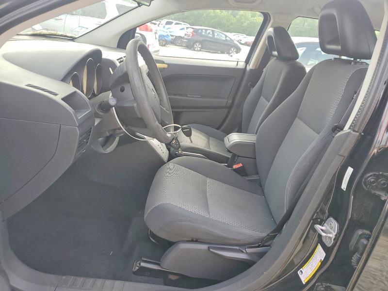 2009 Dodge Caliber VIN 1B3HB48AX9D171170 COPART salvage auction — NORMAL WEAR, Ma - Certificate Of Title, sold $425 on 2026-07-30 (photo 7)