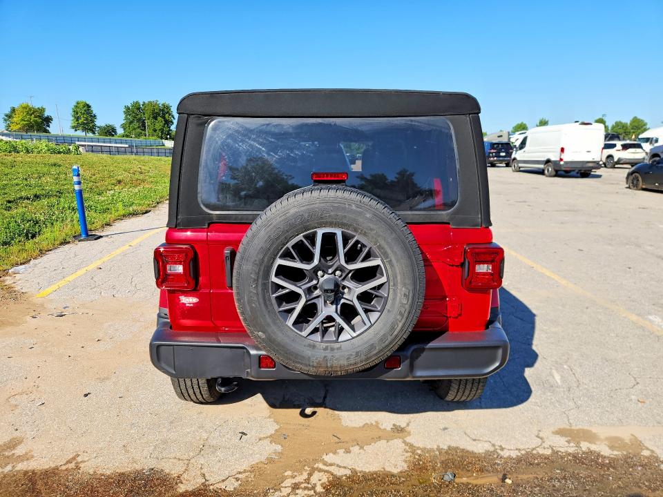 2024 Jeep Wrangler / VIN 1C4PJXEN0RW132730 COPART salvage auction — NORMAL WEAR, MO - CERTIFICATE OF TITLE, sold $23,000 on 2026-07-09 (photo 6)