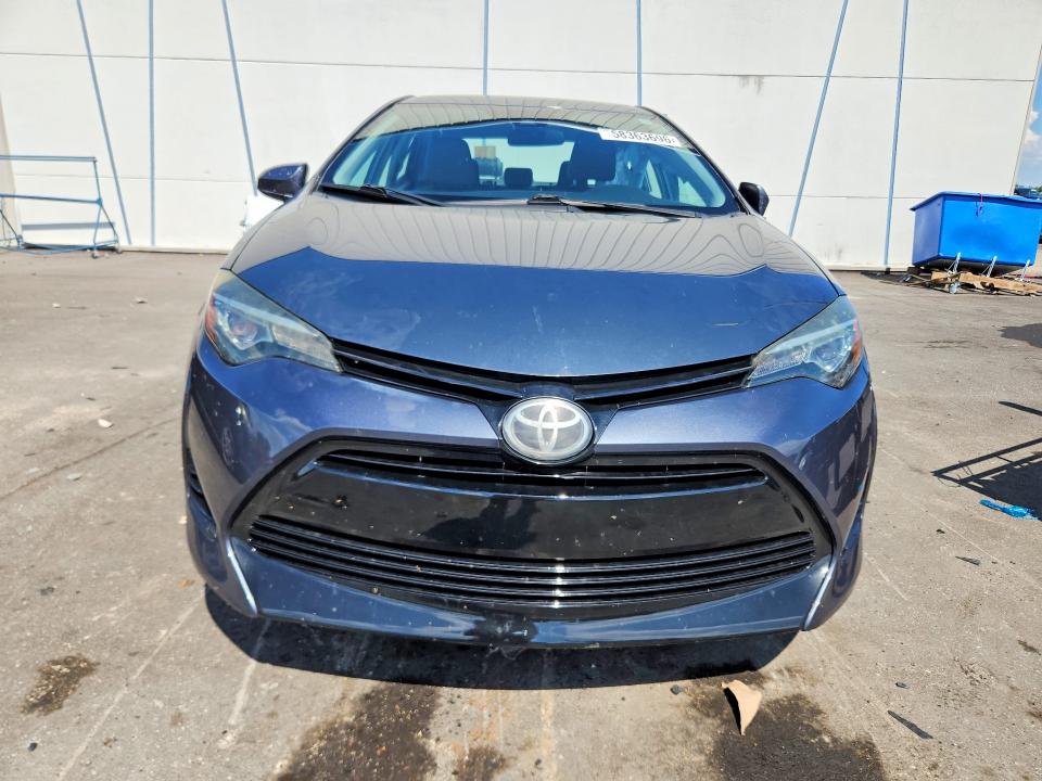 2018 Toyota VIN 5YFBURHE9JP826693 COPART salvage auction — SIDE, Fl - Cert Of Title Slvg Rebuildable, sold $4,050 on 2026-07-06 (photo 5)