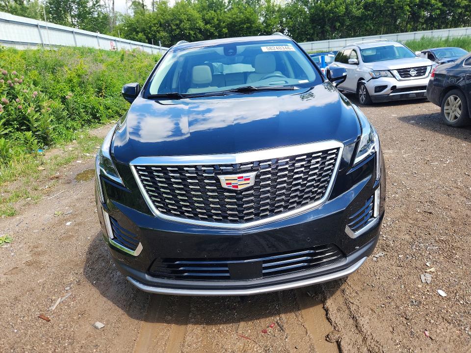 2020 Cadillac Xt5 VIN 1GYKNDRS2LZ154869 COPART salvage auction — REAR END, Mi - Certificate Of Title, sold $8,500 on 2026-08-05 (photo 5)