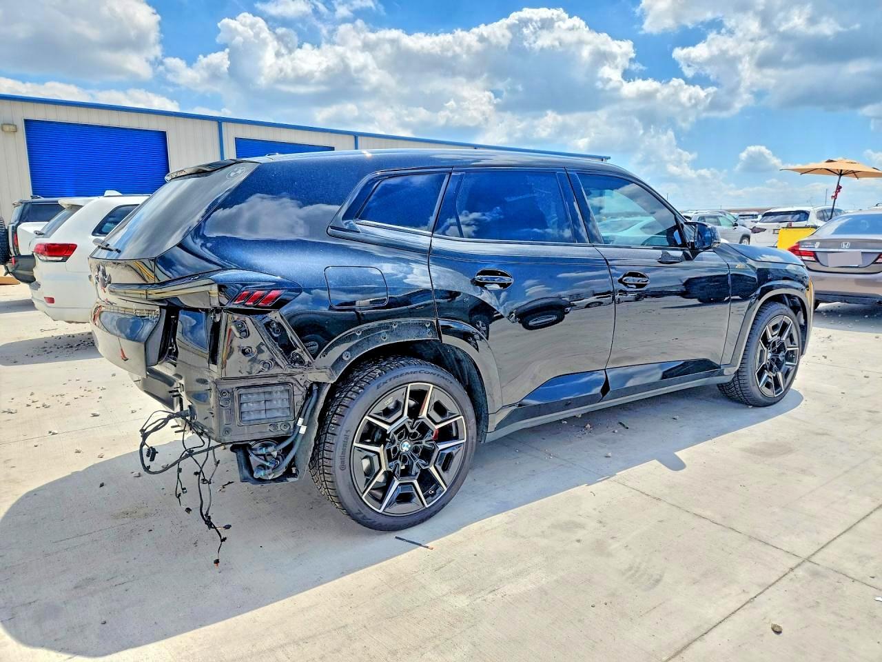 2023 BMW XM VIN 5YM23CS05P9S47414 COPART salvage auction — Rear End, TX - SALVAGE VEHICLE TITLE, sold $67,500 on 2026-08-11 (photo 3)