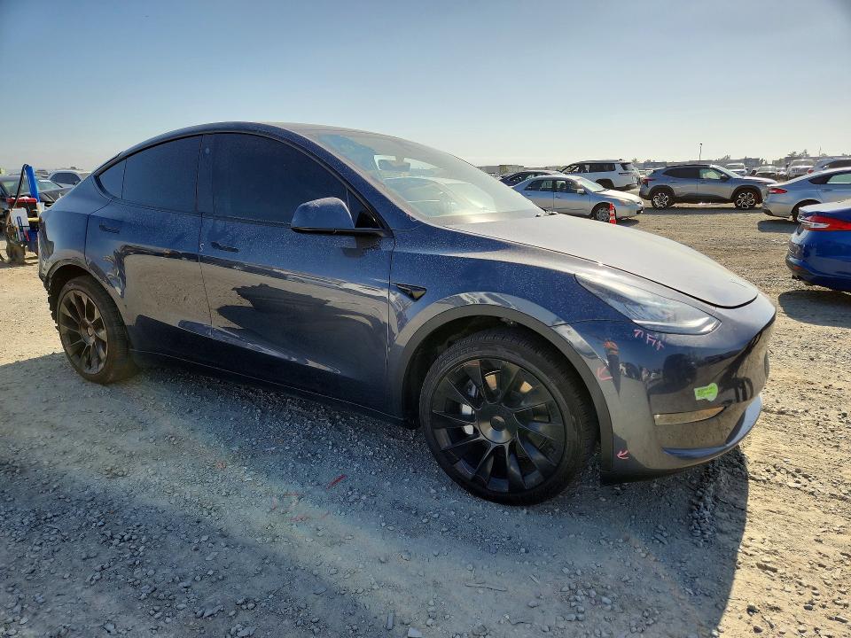 2023 Tesla Model y VIN 7SAYGDEE5PA027538 COPART salvage auction — REAR END, Ca - Salvage Certificate, sold $8,200 on 2026-07-02 (photo 4)