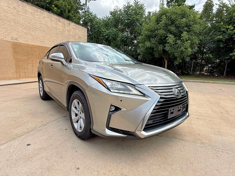 2017 Lexus Rx350 VIN 2T2BZMCA1HC091934 COPART salvage auction — MINOR DENT/SCRATCHES, Md - Certificate Of Title (P), sold $10,000 on 2026-07-14 (photo 1)