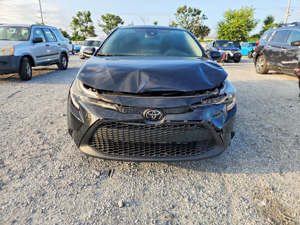 2021 Toyota Corolla VIN JTDEPMAE5MJ158319 COPART salvage auction — FRONT END, FL - CERT OF TITLE SLVG REBUILDABLE, sold $4,800 on 2026-07-31 (photo 5)