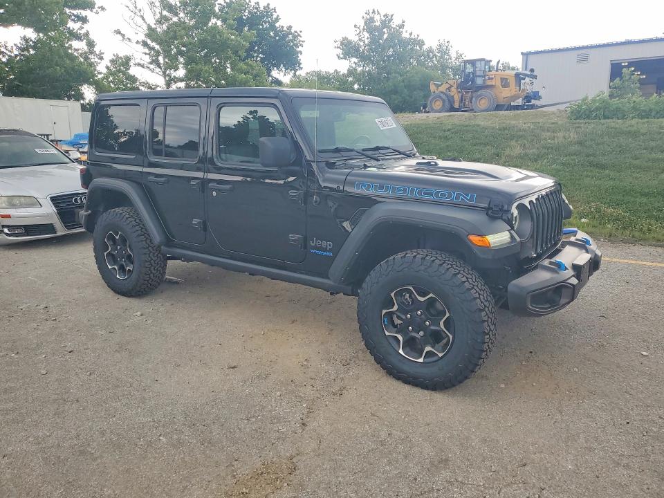 2022 Jeep Wrangler unlimited VIN 1C4JJXR65NW171378 COPART salvage auction — MINOR DENT/SCRATCHES, Mo - Certificate Of Title, sold $21,500 on 2026-07-16 (photo 4)