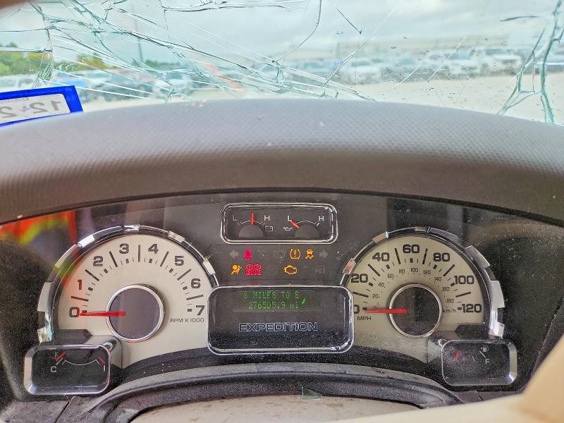 2014 Ford VIN 1FMJU1J56EEF18418 COPART salvage auction — ROLLOVER, Tx - Salvage Vehicle Title, sold $600 on 2026-07-02 (photo 9)