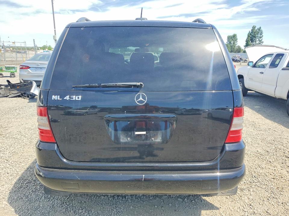 2000 Mercedes-benz M-klasse VIN 4JGAB72E2YA159622 COPART salvage auction — MINOR DENT/SCRATCHES, Or - Certificate Of Title, sold $1,050 on 2026-07-07 (photo 6)