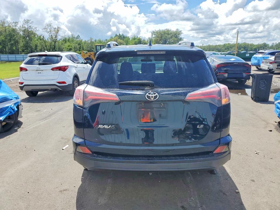2018 Toyota Rav 4 VIN JTMZFREV9JJ174014 COPART salvage auction — MINOR DENT/SCRATCHES, Fl - Certificate Of Title, sold $6,300 on 2026-07-07 (photo 6)