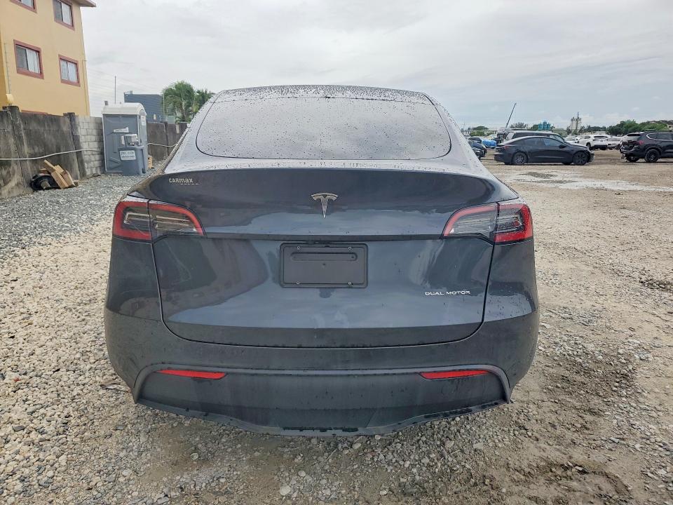 2024 Tesla VIN 7SAYGDEE5RF037184 COPART salvage auction — SIDE, Fl - Cert Of Title Slvg Rebuildable, sold $10,300 on 2026-07-28 (photo 6)