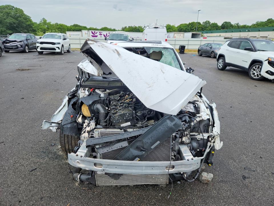 2024 Audi A4 VIN WAUEAAF41RA051871 COPART salvage auction — ROLLOVER, AZ - CERT OF TITLE- NON REPAIR, sold $850 on 2026-07-29 (photo 5)