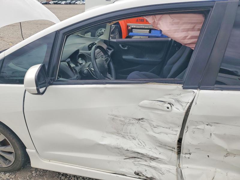 2012 Honda Fit VIN JHMGE8H59CC017931 COPART salvage auction — SIDE, Ar - Cert Of Title-Salvage, sold $125 on 2026-07-27 (photo 7)