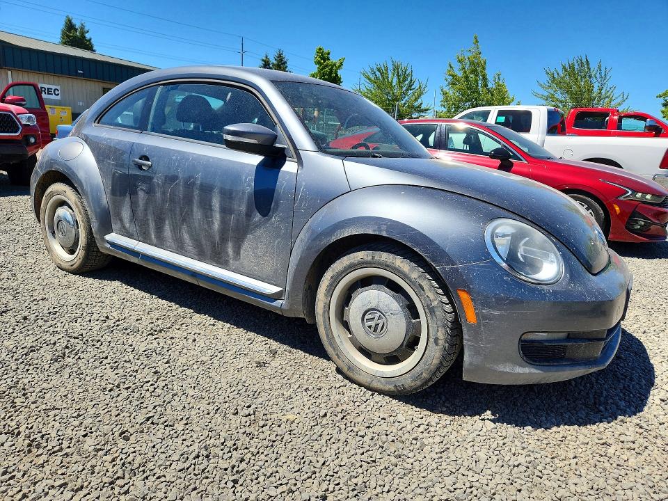 2012 Volkswagen Beetle VIN 3VWJP7AT5CM614980 COPART salvage auction — MINOR DENT/SCRATCHES, Or - Salvage Title Certificate, sold $2,100 on 2026-08-04 (photo 4)