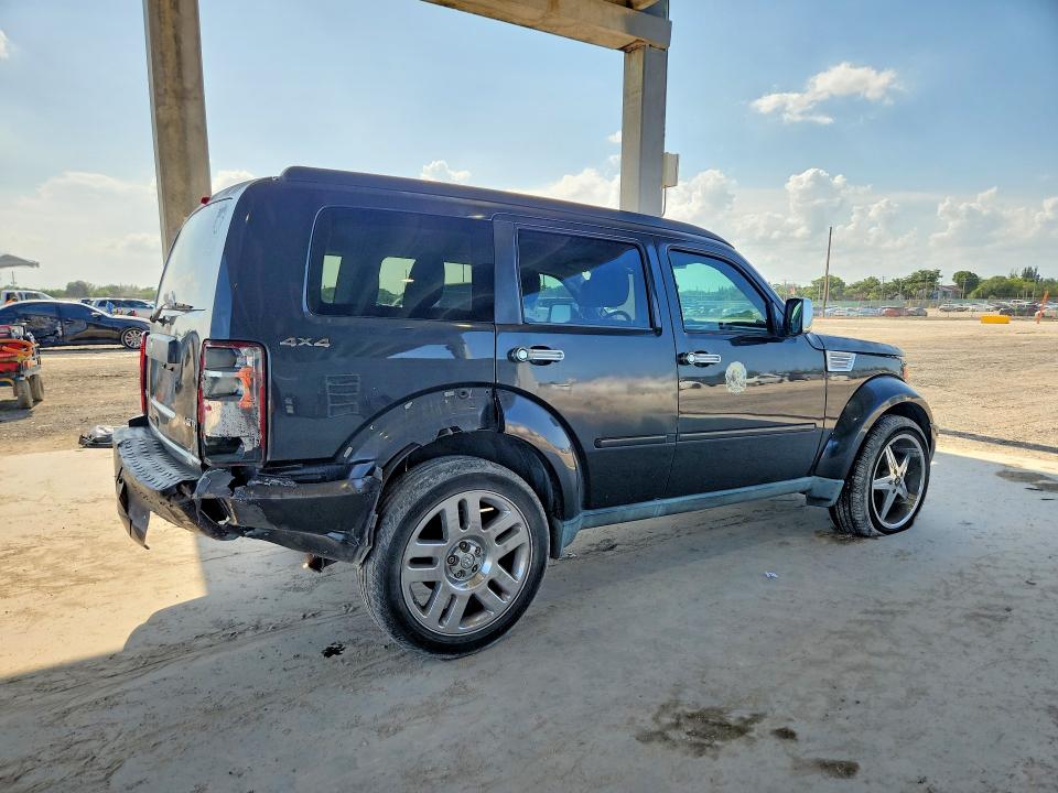 2011 Dodge VIN 1D4PU4GK4BW590627 COPART salvage auction — REAR END, FL - CERT OF TITLE SLVG REBUILDABLE, sold $350 on 2026-07-02 (photo 3)