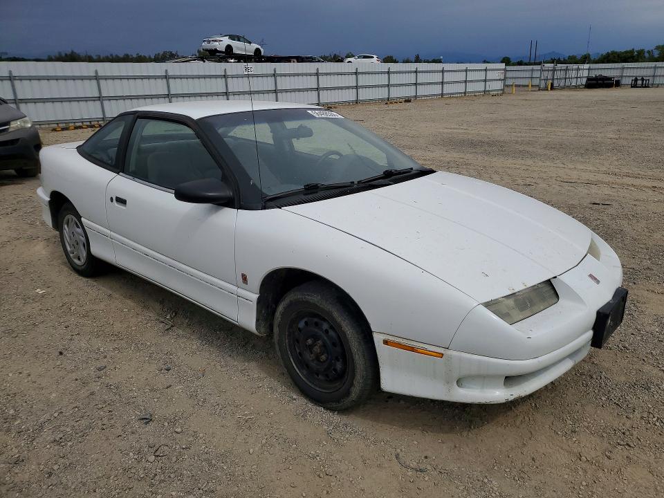 1996 Saturn Sc VIN 1G8ZE1285TZ325352 COPART salvage auction — MINOR DENT/SCRATCHES, Ca - Dis/Dlr/Exp Only Clean Title, sold $60 on 2026-07-31 (photo 4)