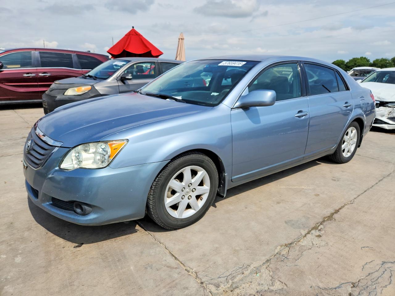 2009 Toyota Avalon VIN 4T1BK36BX9U351531 COPART salvage auction — Normal Wear, TX - CERTIFICATE OF TITLE, sold $1,400 on 2026-07-09 (photo 1)