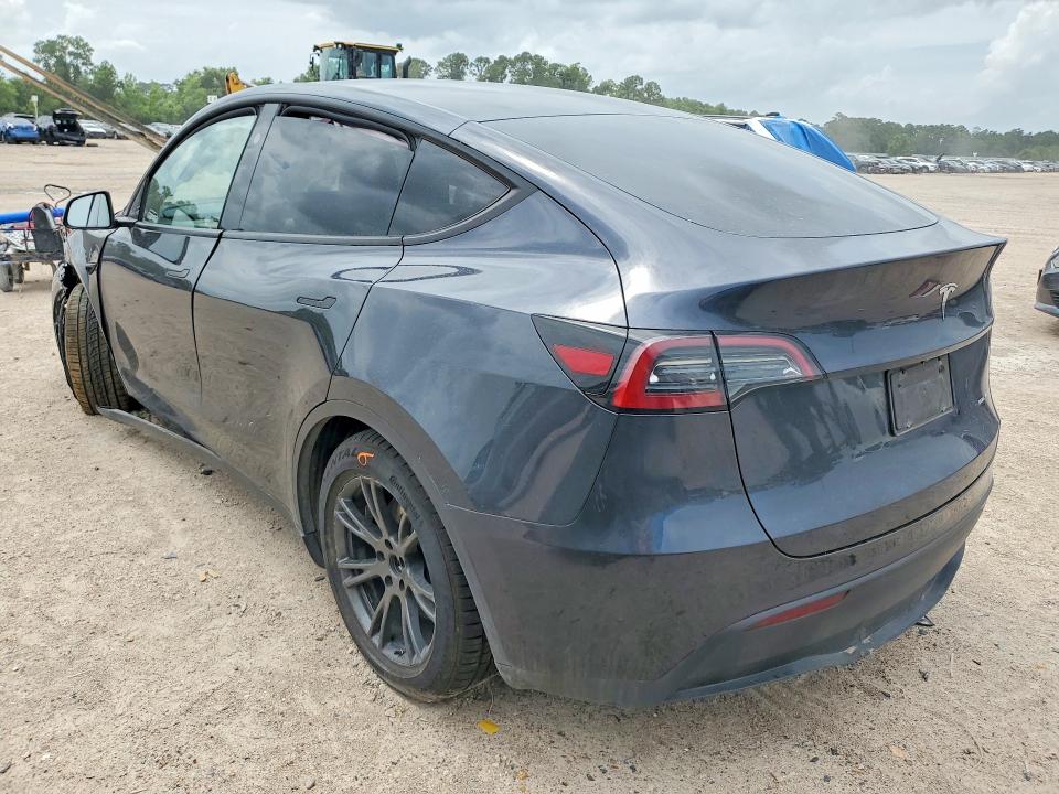 2025 Tesla Model y VIN 7SAYGDEE9SA353397 COPART salvage auction — FRONT END, TX - SALVAGE VEHICLE TITLE (P), sold $14,000 on 2026-07-17 (photo 2)