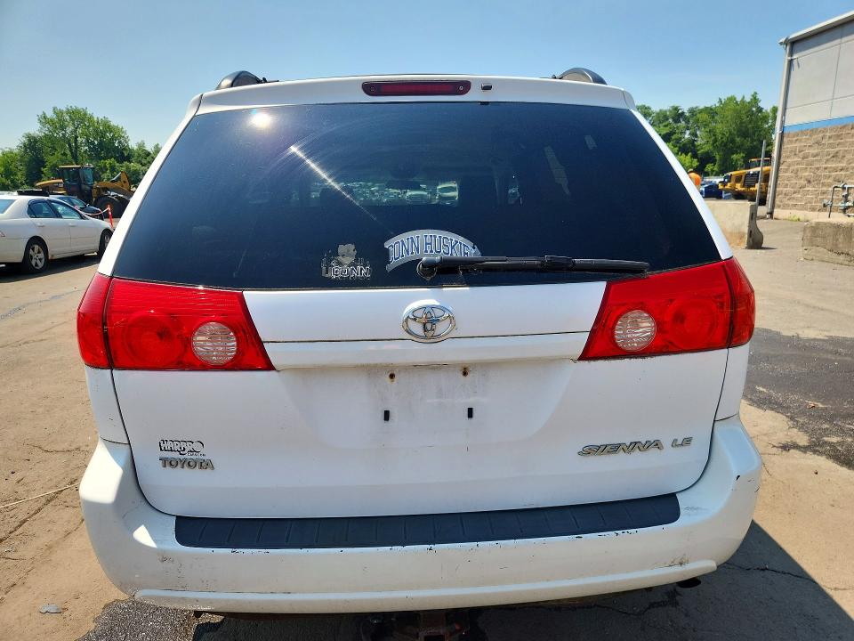 2010 Toyota Sienna VIN 5TDKK4CC2AS298873 COPART salvage auction — SIDE, CT - CERT OF TITLE-SALVAGE, sold $950 on 2026-07-10 (photo 6)