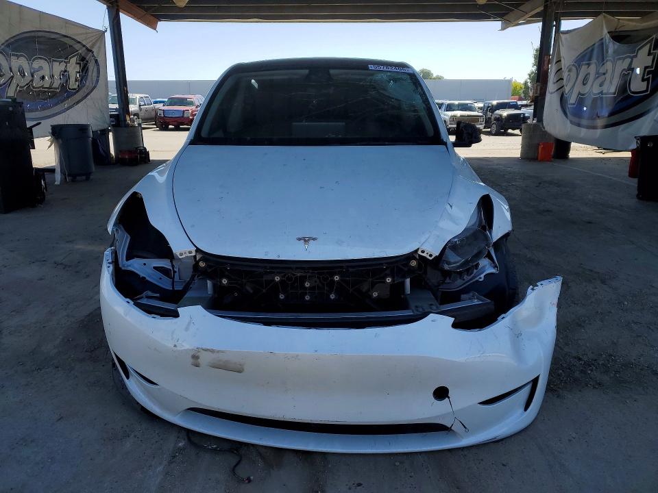 2023 Tesla Model y VIN 7SAYGDEE0PF744805 COPART salvage auction — FRONT END, CA - SALVAGE CERTIFICATE, sold $4,100 on 2026-07-28 (photo 5)