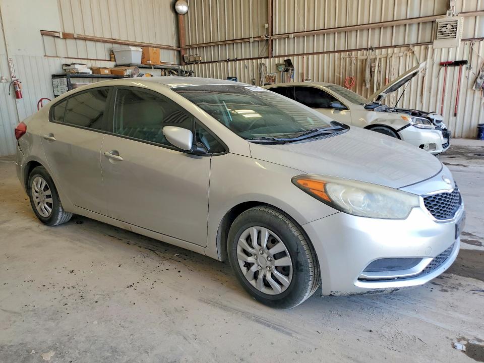 2014 Kia Forte VIN KNAFK4A65E5125551 COPART salvage auction — REAR END, Tx - Salvage Vehicle Title, sold $325 on 2026-07-24 (photo 4)