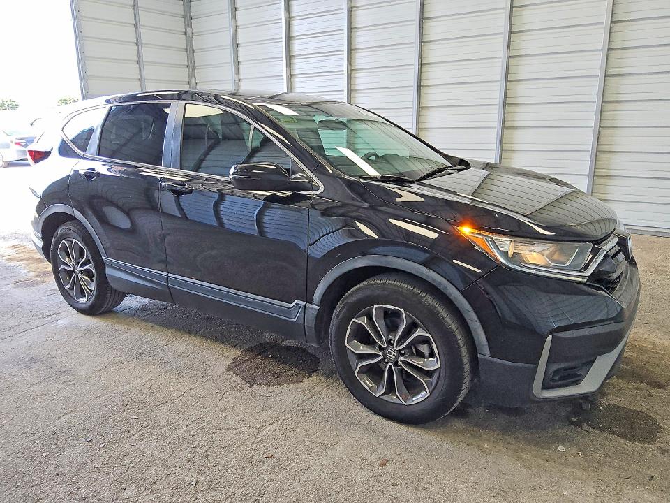 2020 Honda Cr-v VIN 7FARW1H51LE023065 COPART salvage auction — MINOR DENT/SCRATCHES, FL - CERTIFICATE OF TITLE, sold $14,700 on 2026-07-14 (photo 4)