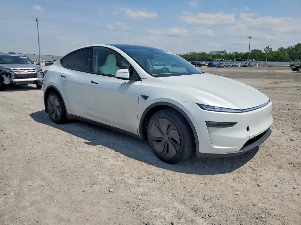 2026 Tesla Model y VIN 7SAYGDEE0TF551113 COPART salvage auction — SIDE, Ny - Mv-907A Salvage Certificate, sold $24,700 on 2026-07-20 (photo 4)