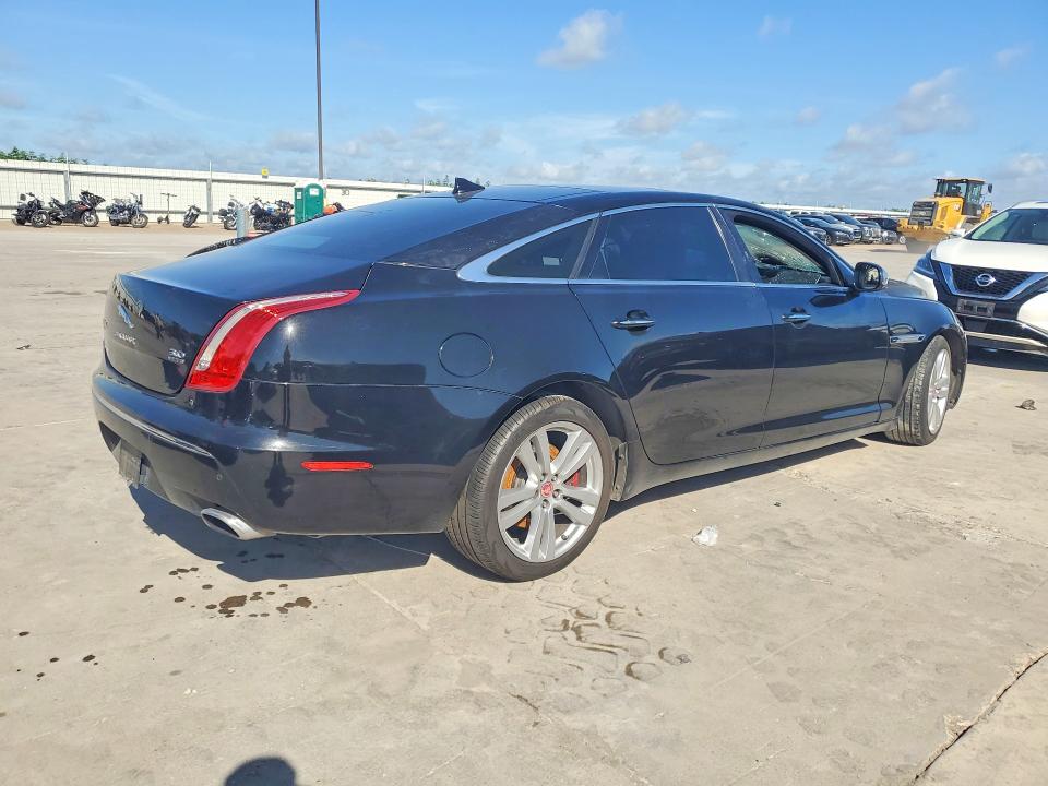 2015 Jaguar Xj series VIN SAJWJ2GD4F8V81199 COPART salvage auction — ENGINE BURN, Tx - Salvage Vehicle Title, sold $550 on 2026-07-02 (photo 3)