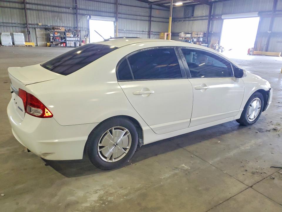 2010 Honda Civic hybrid VIN JHMFA3F22AS007411 COPART salvage auction — MECHANICAL, Fl - Cert Of Title Slvg Rebuildable, sold $400 on 2026-07-13 (photo 3)