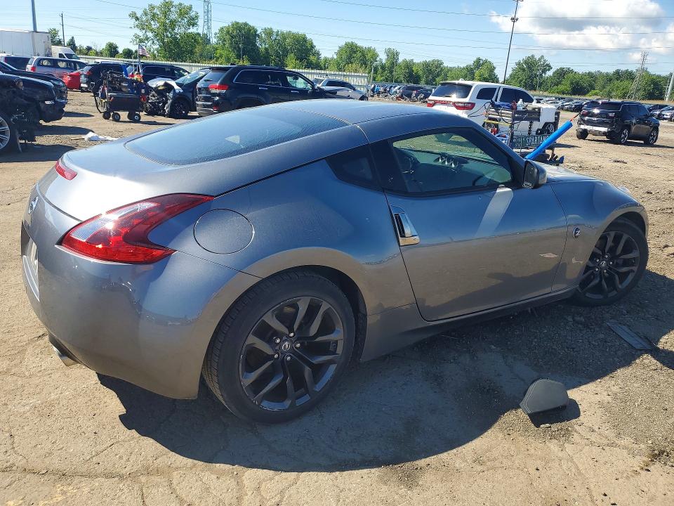 2018 Nissan VIN JN1AZ4EH7JM570347 COPART salvage auction — SIDE, Mi - Certificate Of Title, sold $8,000 on 2026-07-14 (photo 3)