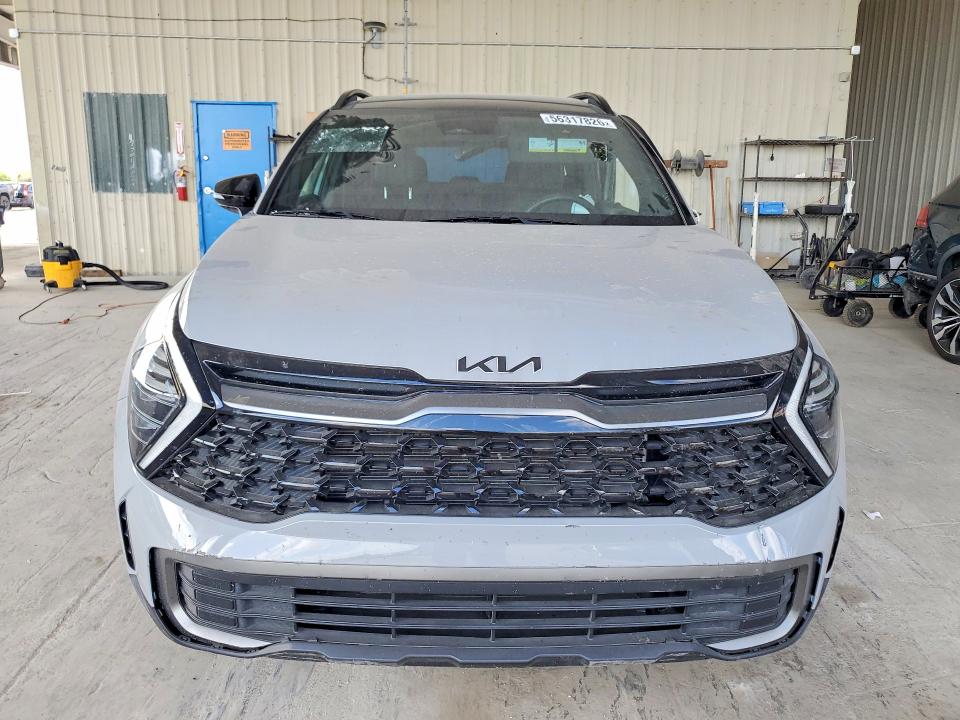 2024 Kia Sportage VIN 5XYK6CDF6RG189705 COPART salvage auction — SIDE, Fl - Cert Of Title Slvg Rebuildable, sold $4,850 on 2026-07-22 (photo 5)